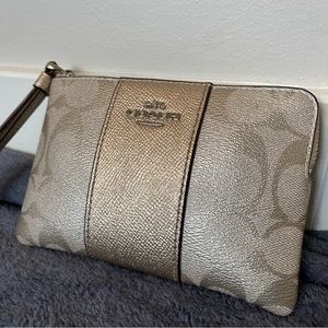 COACH Zip Wristlet Pebbled Leather Champagne Metallic Signature Logo